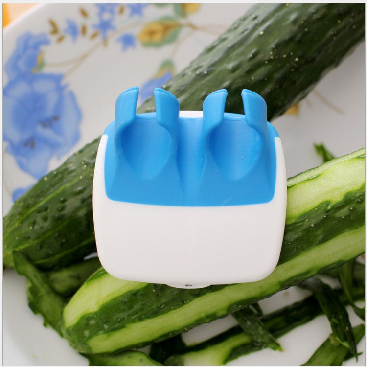 Creative finger fruit peeler