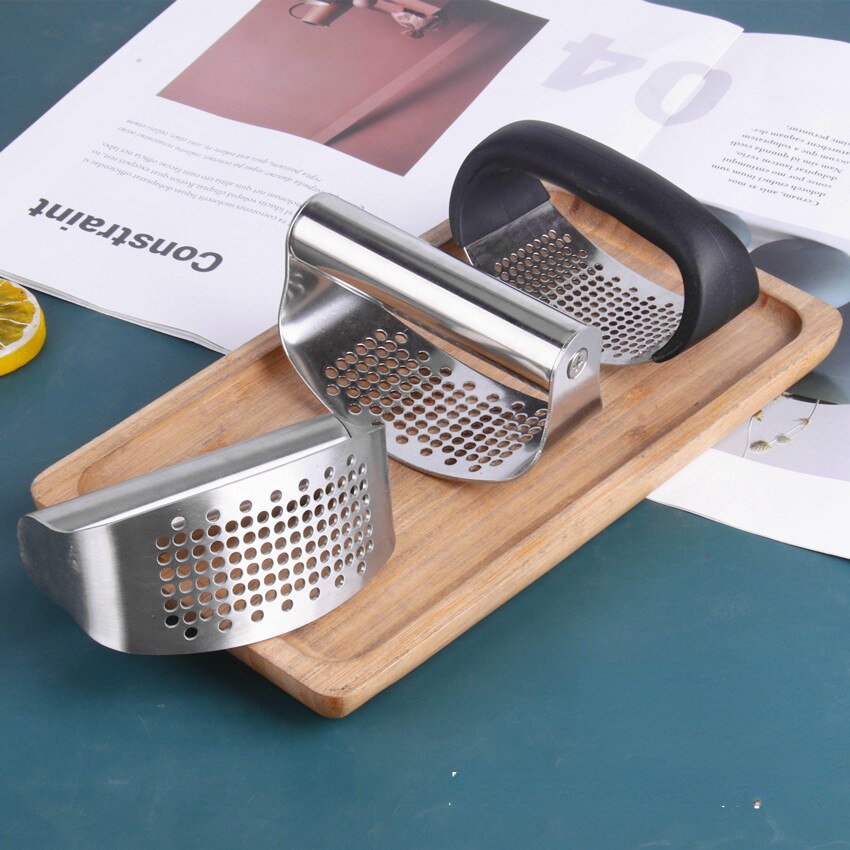 Stainless steel garlic mashing tool