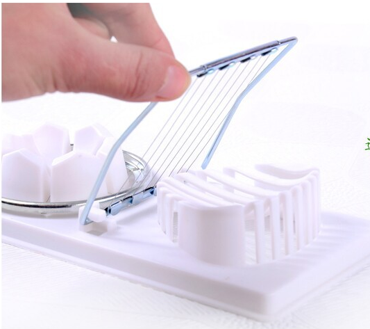 Two - in - one double - head egg cutter is a multi - function egg slicer with taste design
